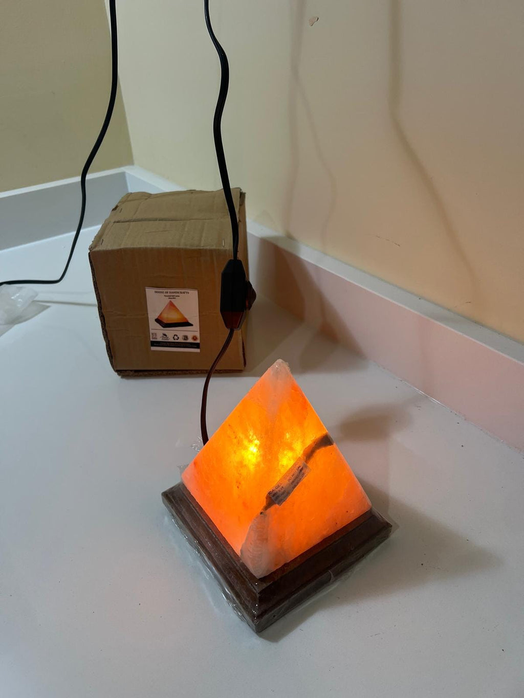 Pyramid Himalayan Pink Salt Lamp, hand-carved crystal, warm amber glow